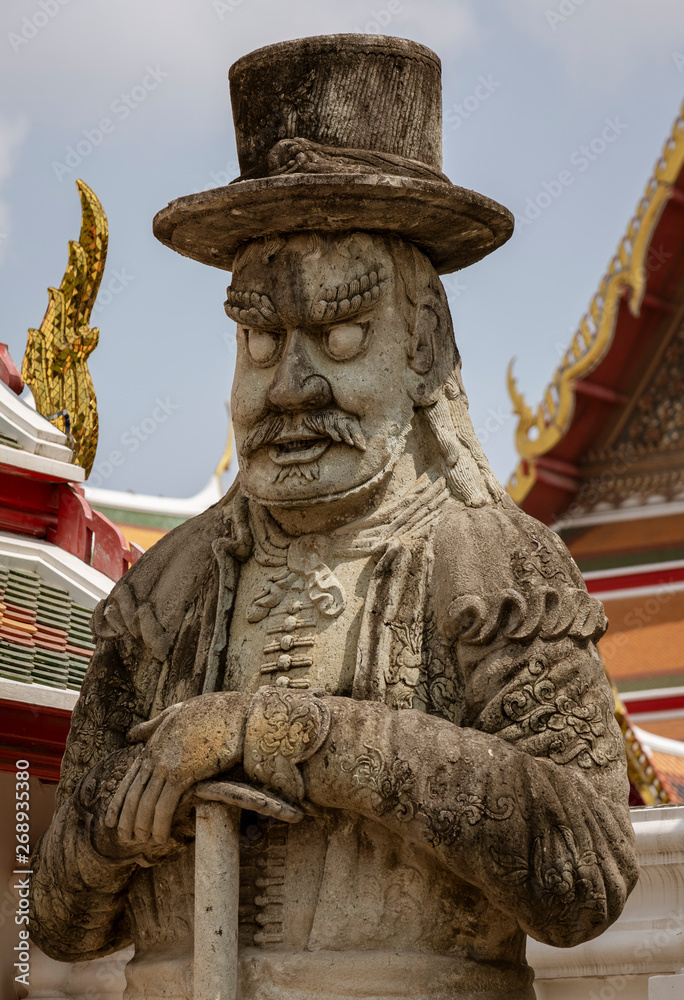 Fototapeta premium Chinese Warrior Guardian Statue At the Wat Pho Temple in Bangkok, Thailand