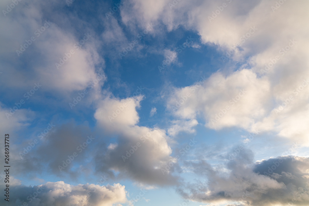 Fototapeta premium White Clouds and Blue Skies Along Ocean