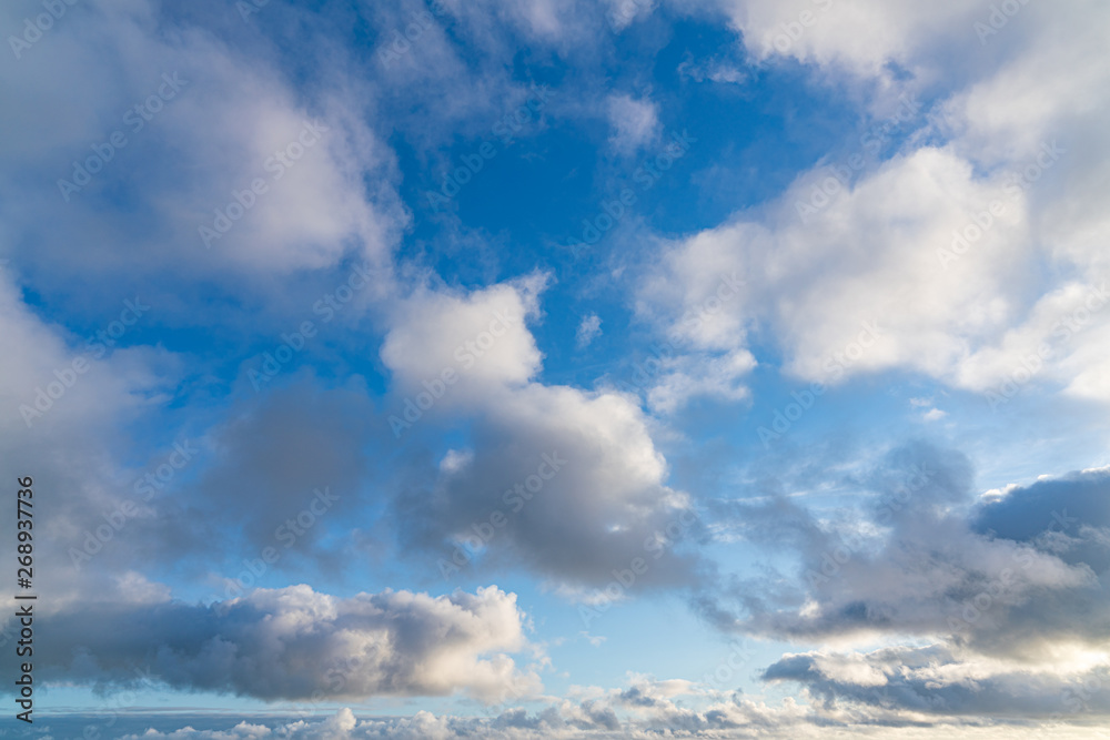 White Clouds and Blue Skies Along Ocean White Clouds and Blue Skies Along Ocean