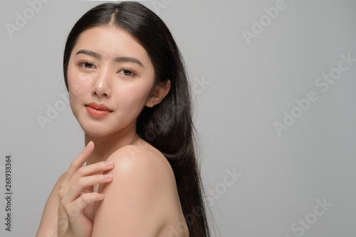 Beautiful young woman asian with clean perfect skin. Portrait model natural make up. Spa, skincare and health wellness