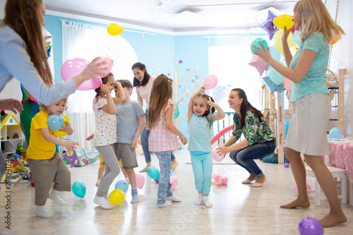 Happy children and their pa...