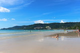 Phuket Province, Thailand - November17, 2017: Nai Harn Beach. Beautiful beach and sea in Phuket, Thailand.   Traveller from around the world come to relax in the summer holidays.
