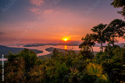 The natural background of the secret light of the evening sky on the panoramic viewpoint, can see the surrounding atmosphere (mountains, rivers, trees) and the wind blowing through the cool.  © bangprik