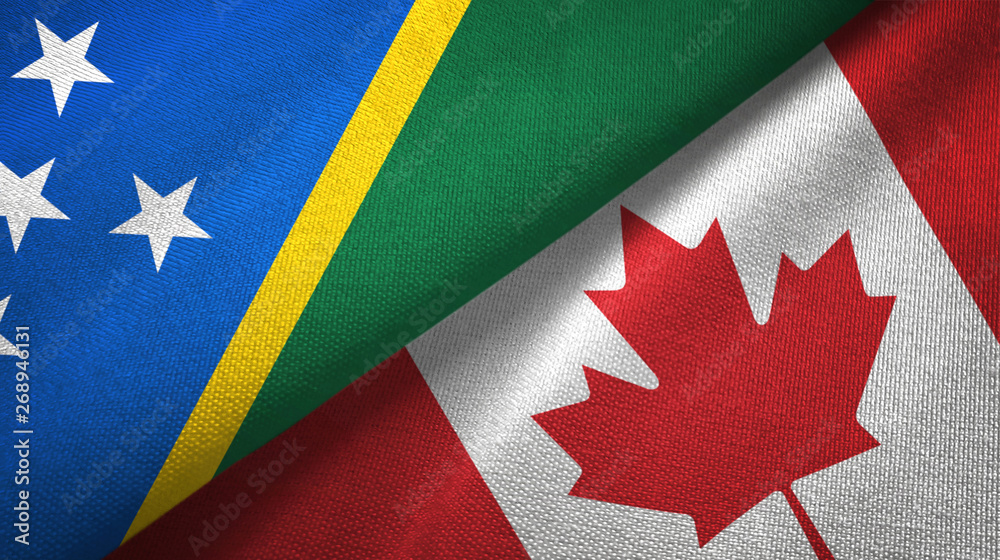 Fototapeta premium Solomon Island and Canada two flags textile cloth, fabric texture 