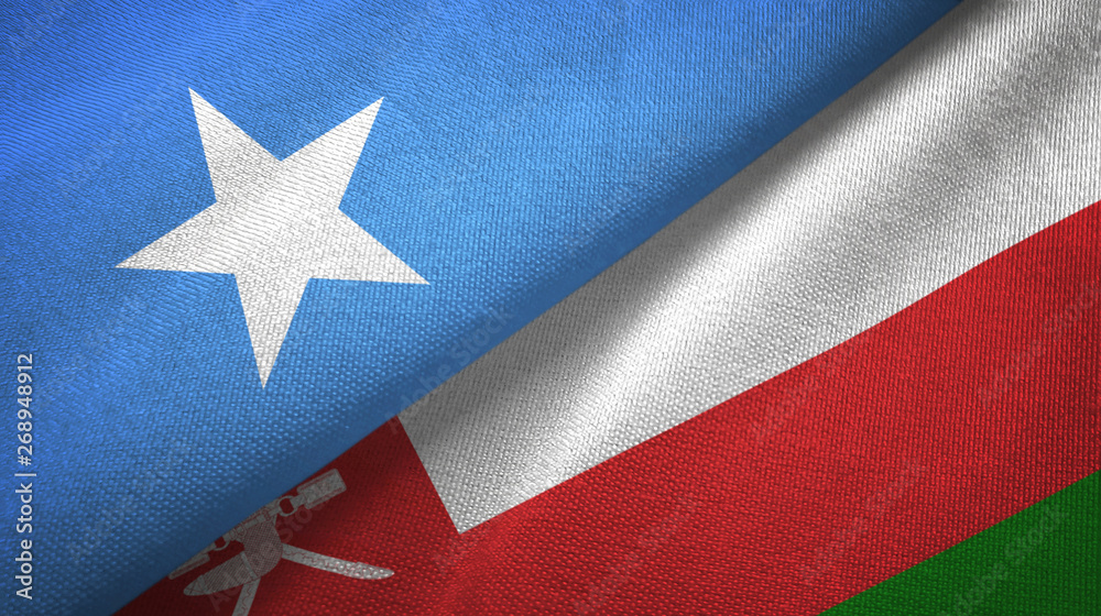 Fototapeta premium Somalia and Oman two flags textile cloth, fabric texture