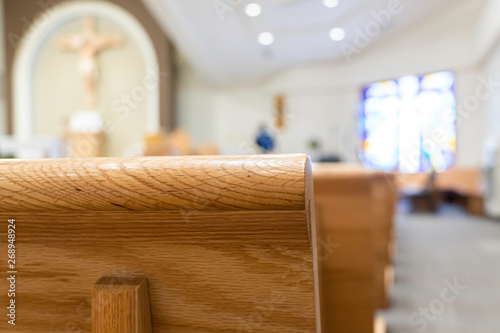 Church pews in Church for Christian religious services photo
