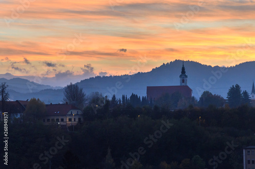 View of church of St. Martina on sunset in Kranj. Slovenia © Elena Odareeva