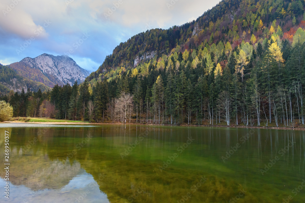 View of Mount Skuta. Plansar Lake or Plansarsko jezero on valley Zgornje Jezersko in northern Slovenia