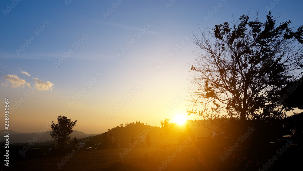 The landscape of the mountains in the evening, people come to watch the beautiful sunset.