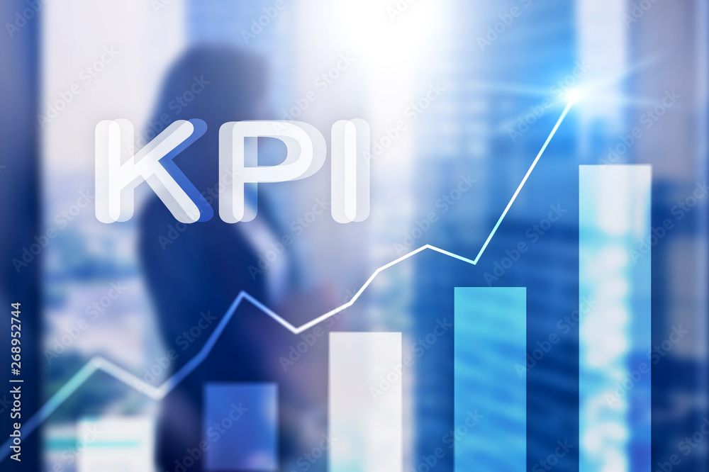 KPI - Key Performance Indicator. Business and technology concept. Multiple exposure, mixed media. Financial concept on blurred background KPI - Key Performance Indicator. Business and technology concept. Multiple exposure, mixed media. Financial concept on blurred background