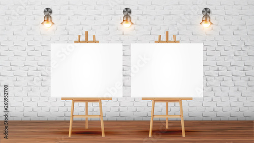 Canvas On Tripod For Collective Drawing Vector. Wooden Drawing Easel With Blank White Sheet, Glowing Sconces On Brick Wall Decoration Of Room For Art Courses. Realistic 3d Illustration