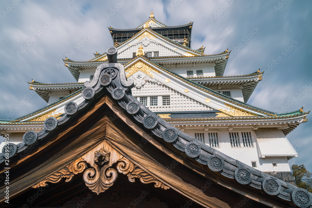 Beautiful Japanese traditional architectural details at Osaka Castle. Osaka Castle is one of the most famous historic landmarks in Japan. Beautiful Japanese traditional architectural details at Osaka Castle. Osaka Castle is one of the most famous historic landmarks in Japan.