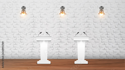 Interior Of Elections Debate Auditorium Vector. Modern Design Auditorium White Rostrums With Microphones On Wooden Floor And Lighting Sconces On Brick Wall. Realistic 3d Illustration