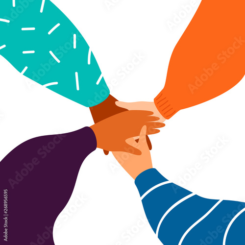 Four female hands support each other, concept of teamwork, women power. Diverse human hands united for social freedom and peace.