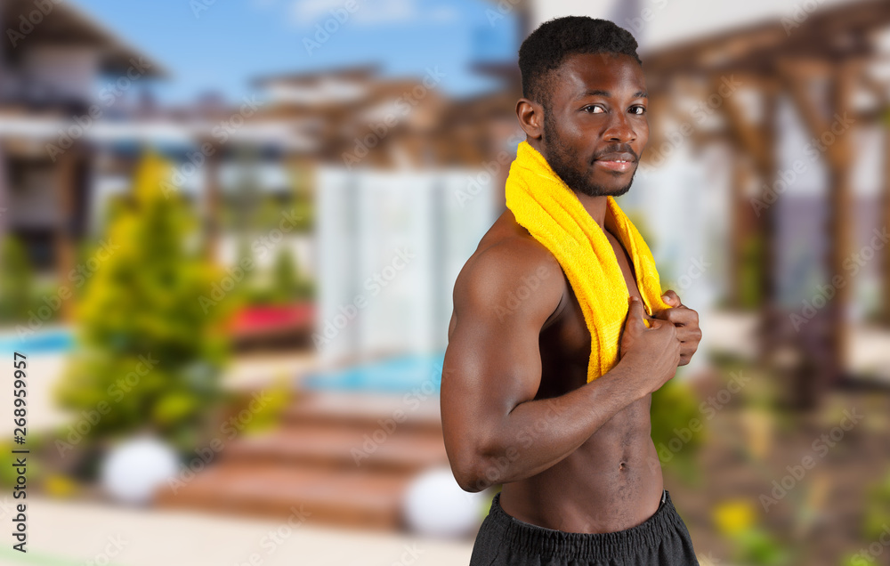 Obraz premium Portrait of a bare chested African American athlete isolated