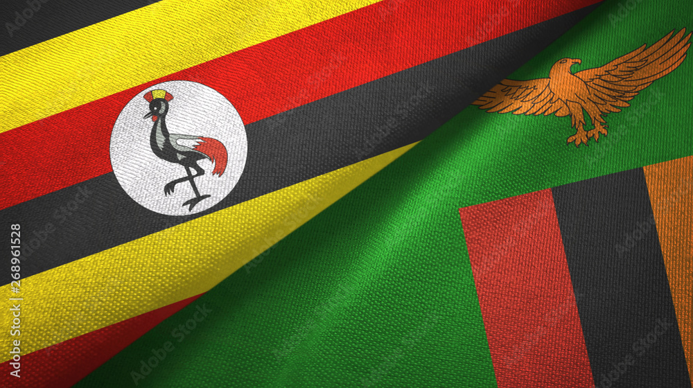 Fototapeta premium Uganda and Zambia two flags textile cloth, fabric texture