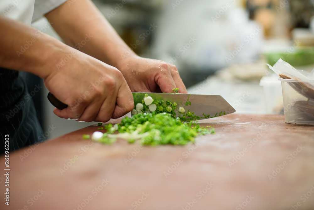 chef Slicing vegetables on wood background, food, 