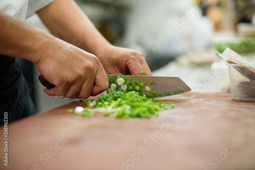 Fényképezés chef Slicing vegetables on wood background, food,