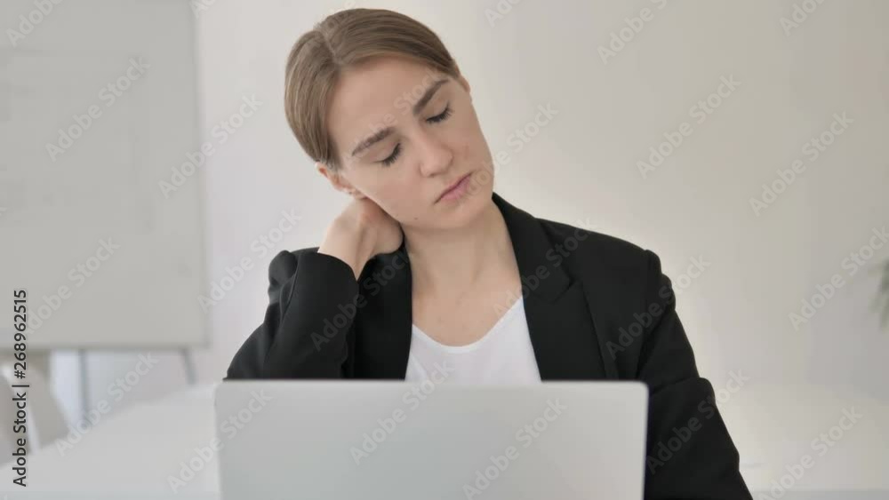 Close Up of Young Businesswoman Relaxing Neck Pain Close Up of Young Businesswoman Relaxing Neck Pain