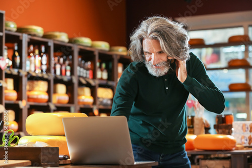 Business owner ordering goo...