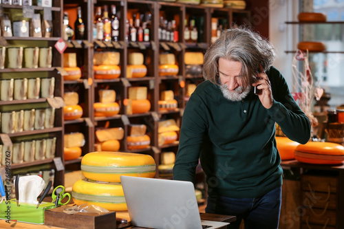 Business owner ordering goo...