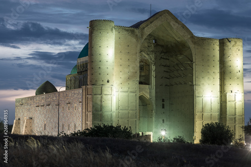 walls of an ancient castle at night