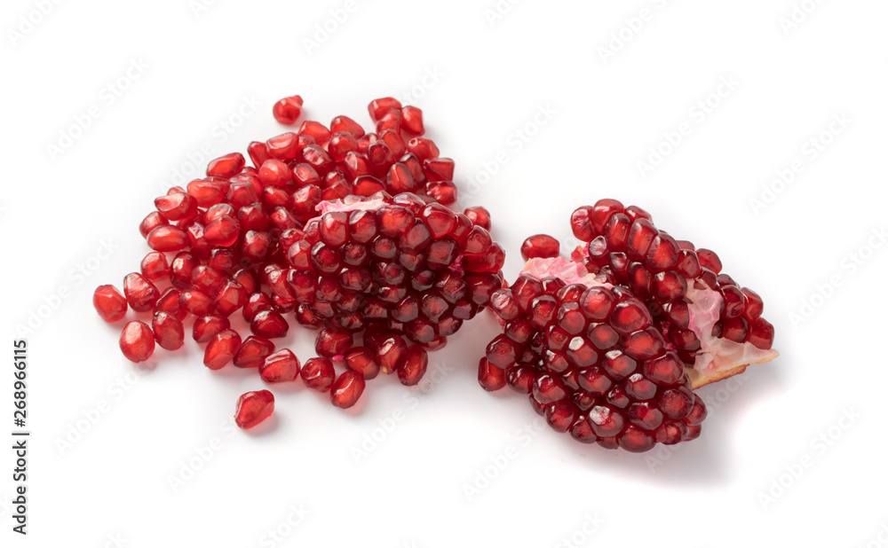 Scattered Pomegranate Seeds Isolated on White Background Scattered Pomegranate Seeds Isolated on White Background