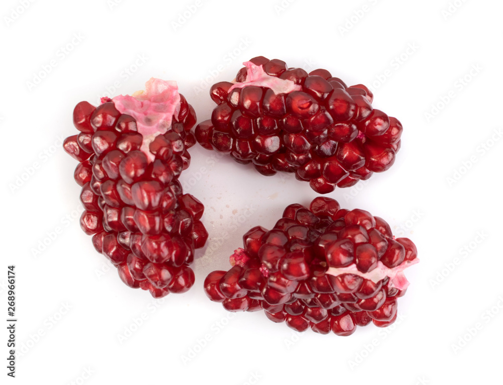 Scattered Pomegranate Seeds Isolated on White Background Scattered Pomegranate Seeds Isolated on White Background