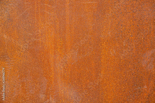 Old rusty red metallic painted abstract background.