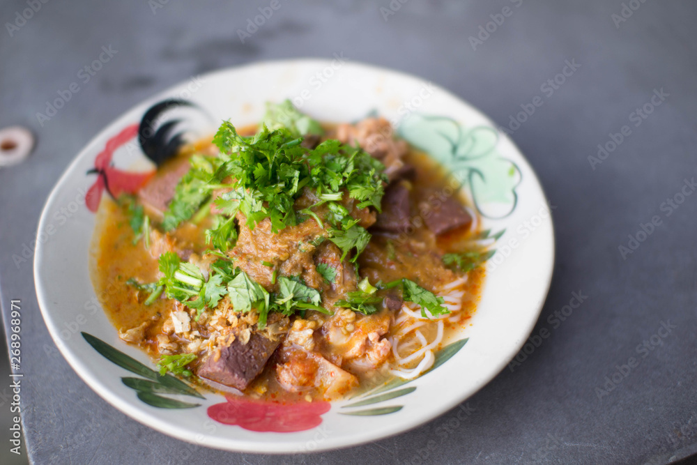 Nam Nguan Noodle, Rice noodles with spicy pork sauce. Nam Nguan Noodle, Rice noodles with spicy pork sauce.