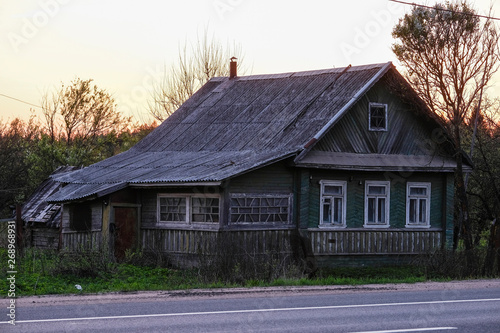 Fototapeta Naklejka Na Ścianę i Meble -  image of old country house near the road