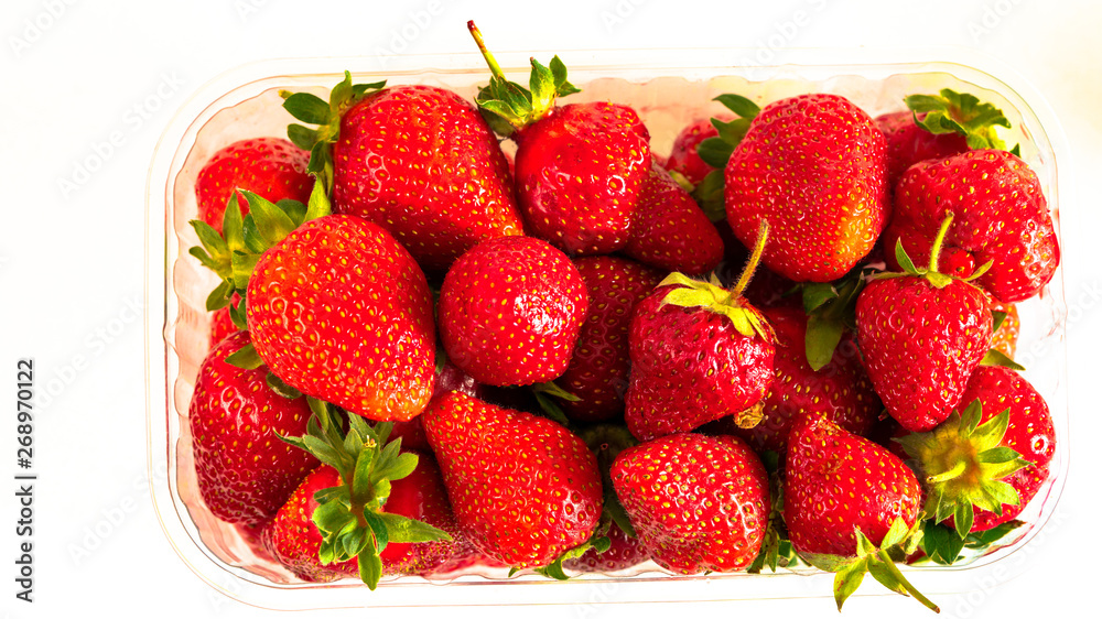 strawberries in a glass on a white background strawberries in a glass on a white background