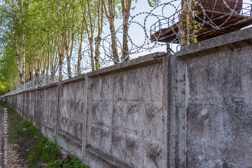 Concrete Wall with Razor Wire in Riga Latvia