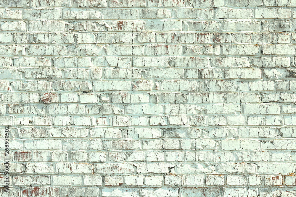 old shabby wall of green brick color as  abstract background in loft style