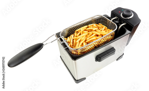 Electric oil fryer appliance frying French fries isolated on a white background