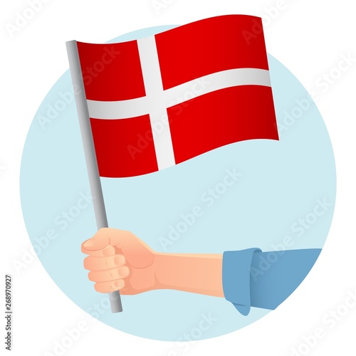 Denmark flag in hand