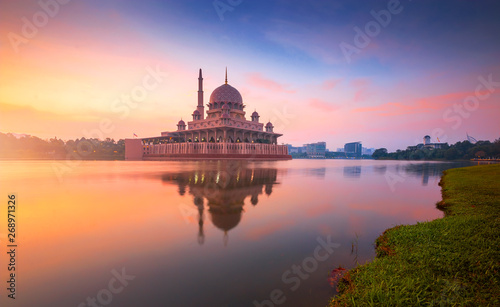 Floating mosque during sunrise. Putra Mosque, Putrajaya, Malaysia.
