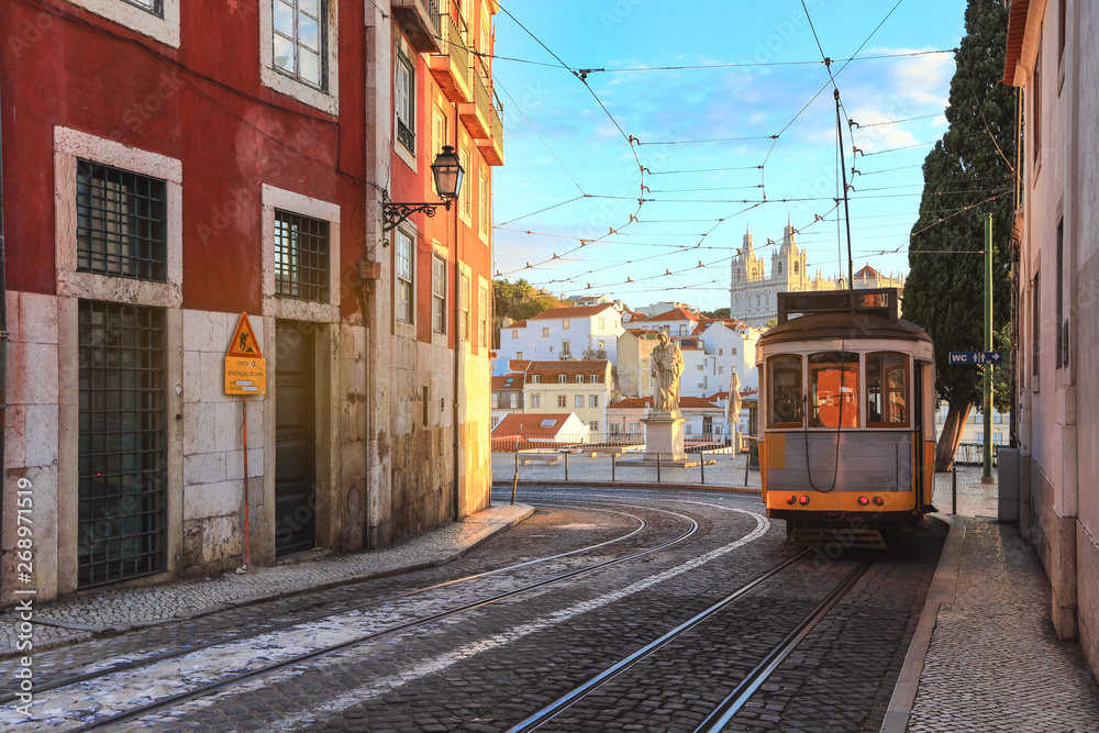 An old traditional tram carriage in the city centre of Lisbon, Portugal. The city kept old traditional tram in service within the historical part of the capital