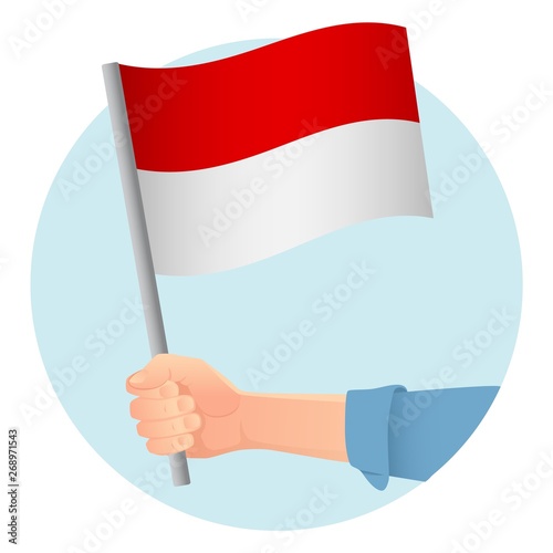Indonesia flag in hand