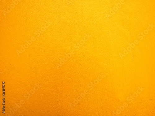 Orange cement wall background.