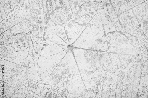 Leaves printed texture patterns on concrete floor background