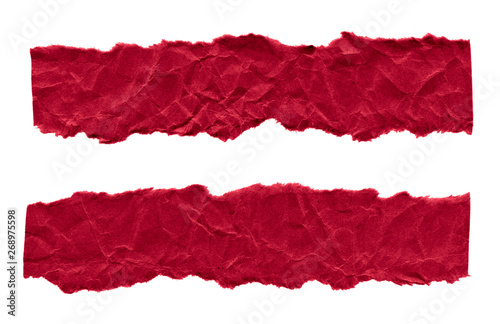 Scraps of dark red paper on a white background. Isolated on white. Ready frame for design, template. Torn paper