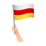 south ossetia flag in hand icon