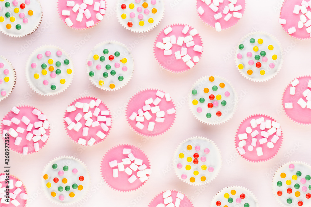 Colorful cupcakes on a white background. Colorful cupcakes on a white background.