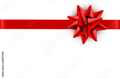 Red bow satin ribbon isolated on white background with clipping path for gift box wrap and holiday card design decoration element.