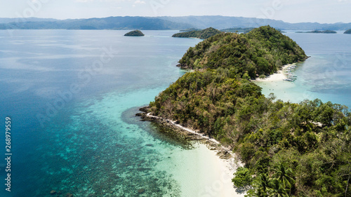 Awesome aerial view of isolated islands in the Philippines. Island hopping tour in Port Barton, Palawan