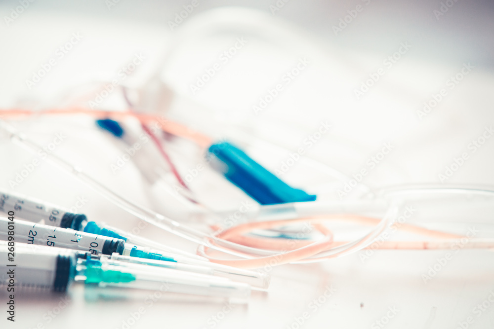 Medical background with  syringe and vaccine bottles