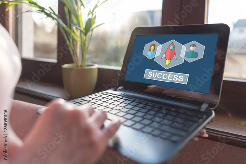 Business success concept on a laptop screen