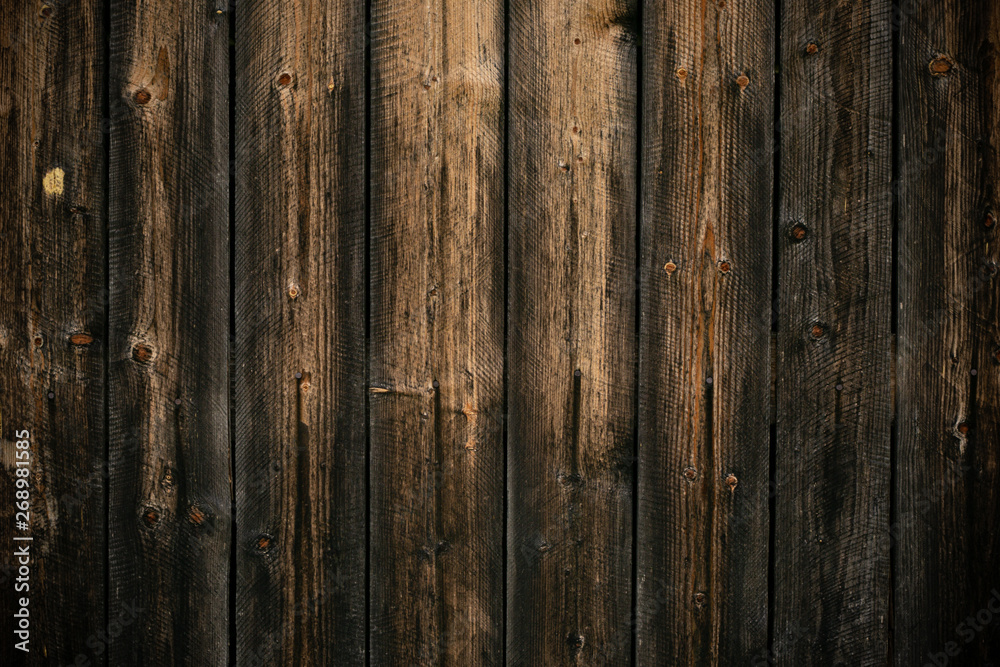 Fototapeta premium Dark yellow and gray shabby wood background. Old wall wooden vintage floor. Texture backdrop. Rough structure. Black yellow pattern of wooden board. Dark wood texture, weathered, rustic oak.