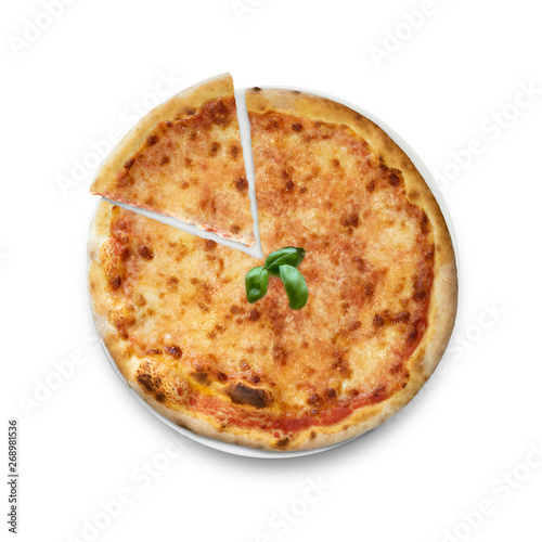 Pizza margherita with slice and basil on plate, white background